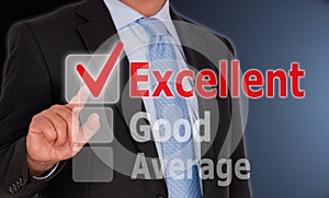 Businessman touching excellent button