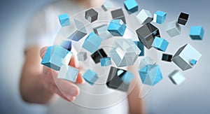 Businessman touching floating blue shiny cube network 3D rendering