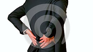 Businessman touching his painful lower back