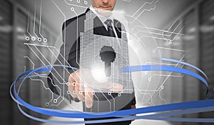 Businessman touching lock on futuristic interface with swirling lines