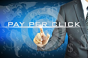 Businessman touching PAY PER CLICK on virtual screen photo