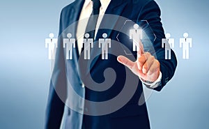 Businessman touching person virtual button about the concept of recruiting person and Personal development photo