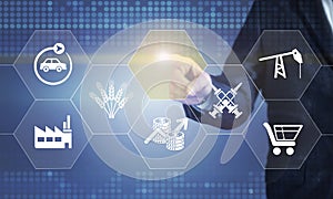 Businessman touching the screen about sectoral consept
