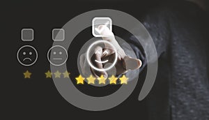 Businessman touching smile face icons and info graphic to evaluate product after use service , customer satisfaction concept