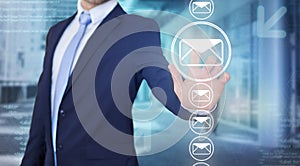 Businessman touching technology interface with professional email icon