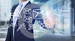 Businessman touching technology interface with professional email icon