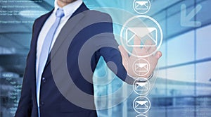 Businessman touching technology interface with professional email  icon