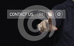 Businessman touching to virtual mobile phone among e-mail and address for business contact and customer service concept