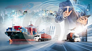Businessman touching virtual screen world map of Global logistics network distribution, Container cargo freight ship