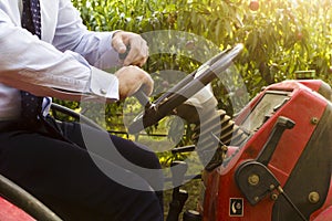 Businessman on tractor