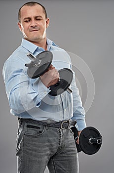 Businessman training with weights