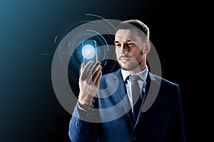 Businessman with transparent smartphone