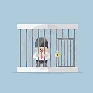 Businessman trapped in a cage