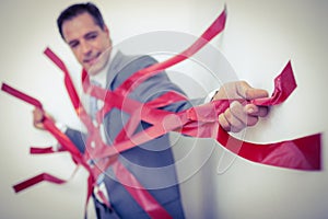 Businessman trapped by red tape