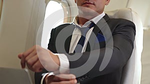 Businessman travel on a business trip by airplane