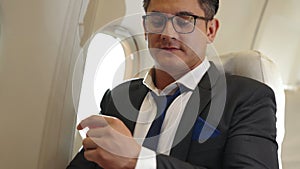 Businessman travel on a business trip by airplane