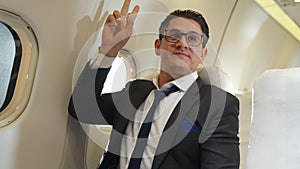Businessman travel on a business trip by airplane