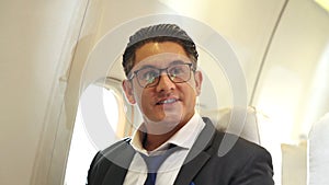 Businessman travel on a business trip by airplane