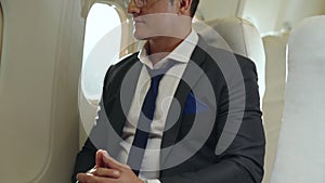 Businessman travel on a business trip by airplane