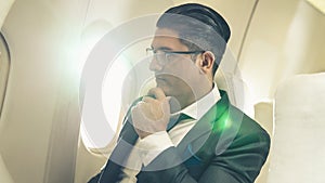 Businessman travel on a business trip by airplane