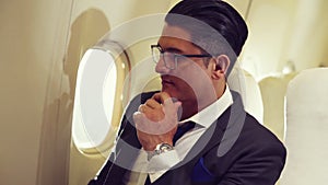 Businessman travel on a business trip by airplane