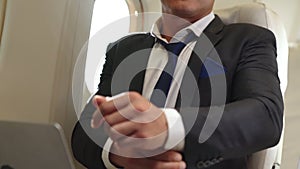 Businessman travel on a business trip by airplane