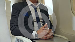 Businessman travel on a business trip by airplane