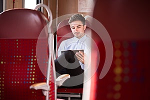 Businessman travelling by bus