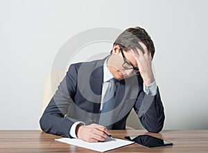 Businessman trying to solve the problem