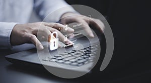 Businessman typing on keyboard laptop computer to input username and password for or technology security system and prevent hacker
