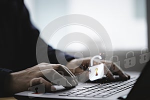 Businessman typing on keyboard laptop computer to input username and password for or technology security system and prevent hacker