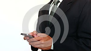 Businessman Typing a Text Message