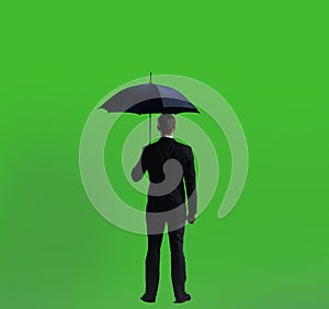 Businessman with umbrella standing over chroma key background. Business, career job concept.