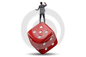 Businessman in uncertainty concept with dice