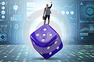 Businessman in uncertainty concept with dice