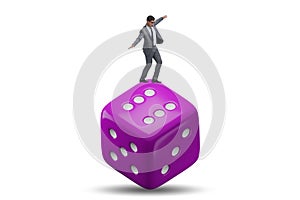 Businessman in uncertainty concept with dice