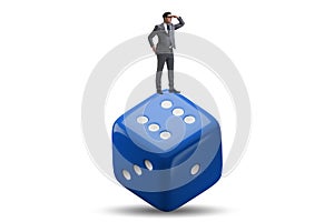 Businessman in uncertainty concept with dice