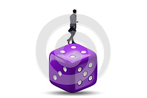 Businessman in uncertainty concept with dice