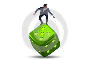 Businessman in uncertainty concept with dice