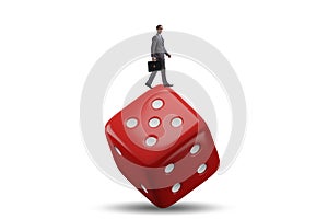 Businessman in uncertainty concept with dice