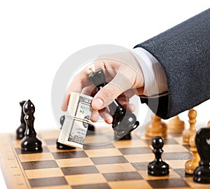 Businessman unfair playing chess game