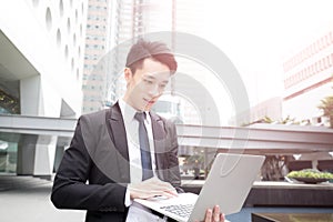 Businessman use computer in honkong