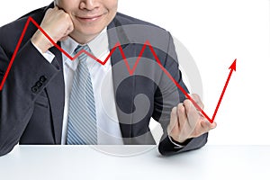 Businessman use finger to change from downing to be rising arrow