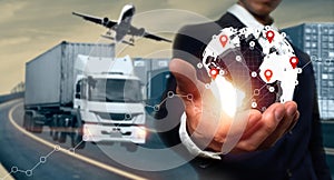 A businessman uses his hands on a logistic network distribution and smart transportation and networking intelligent logistics of