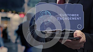 Businessman uses hologram Customer engagement