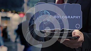 Businessman uses hologram Holography