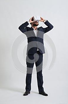 Businessman uses virtual reality glasses