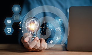 Businessman using computer cloud computing to download and loading data information and upload on system network application.