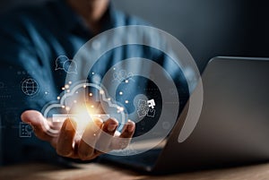 Businessman using computer cloud computing to download and loading data information and upload on system network application.