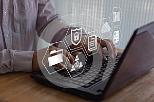 Businessman using a computer to document management concept, online documentation database and digital file storage system